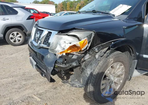 2015 Nissan Armada Platinum z USA, uszkodzony, nr VIN 5N1AA0NE5FN604057